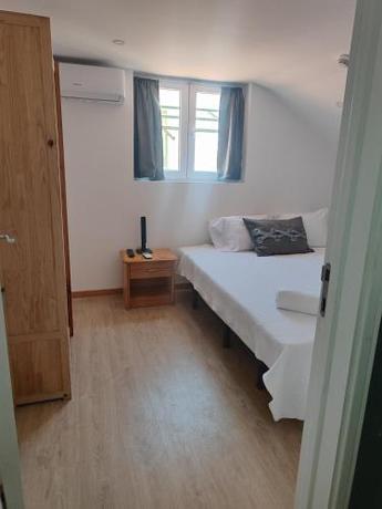 Imagen de la habitación del Hotel Guest House Rooms in Bairro Alto. Foto 17