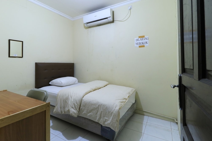 Imagen de la habitación del Hotel Guest House Samarinda. Foto 3