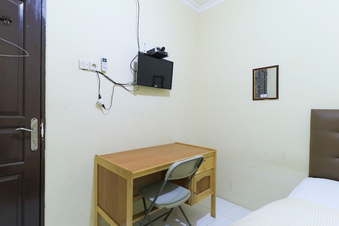 Imagen de la habitación del Hotel Guest House Samarinda. Foto 4