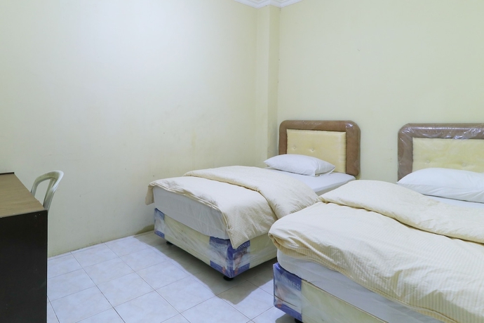 Imagen de la habitación del Hotel Guest House Samarinda. Foto 5