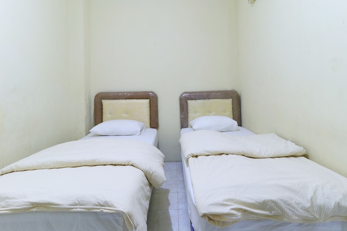 Imagen de la habitación del Hotel Guest House Samarinda. Foto 6