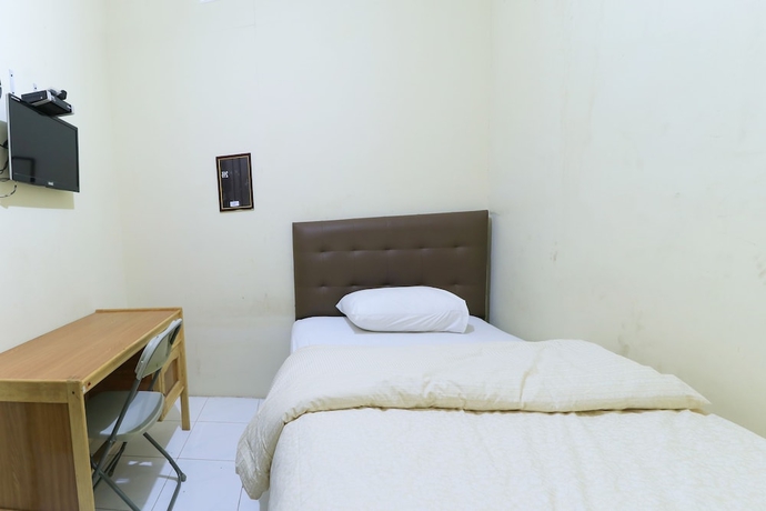 Imagen de la habitación del Hotel Guest House Samarinda. Foto 8