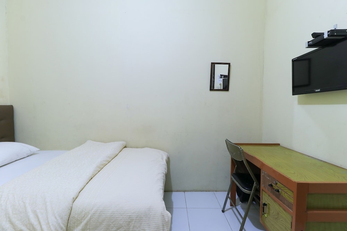 Imagen de la habitación del Hotel Guest House Samarinda. Foto 9