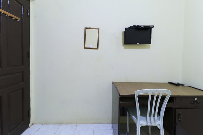 Imagen de la habitación del Hotel Guest House Samarinda. Foto 10