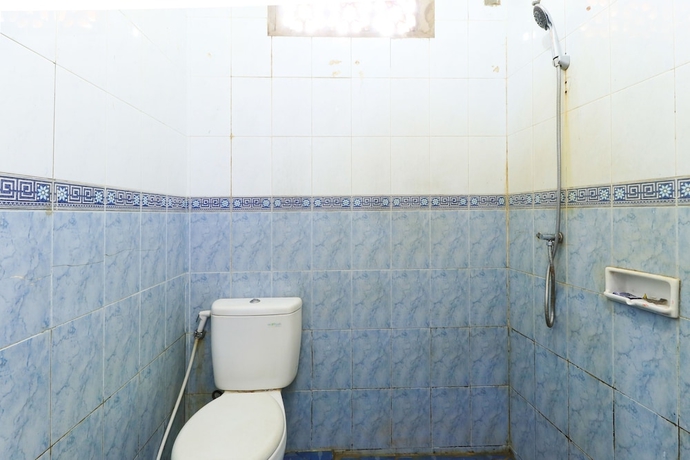 Imagen de la habitación del Hotel Guest House Samarinda. Foto 12