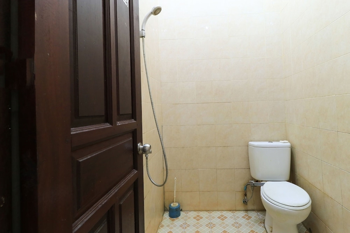 Imagen de la habitación del Hotel Guest House Samarinda. Foto 13