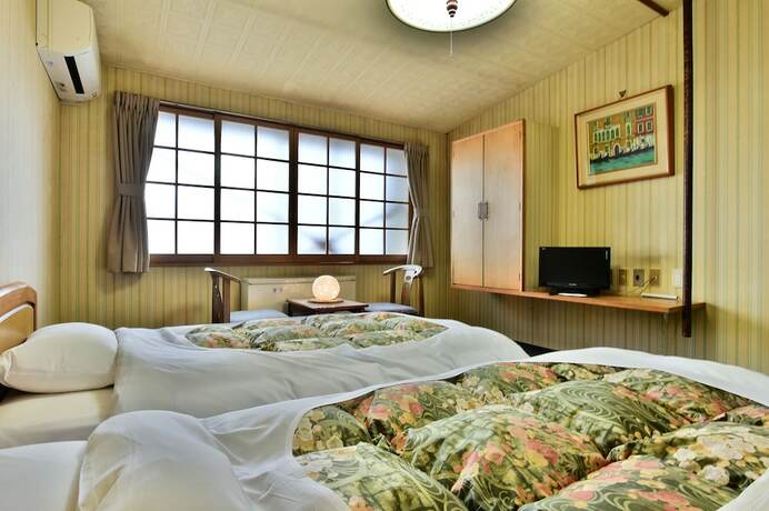 Imagen de la habitación del Hotel Guest House Takenoya. Foto 9