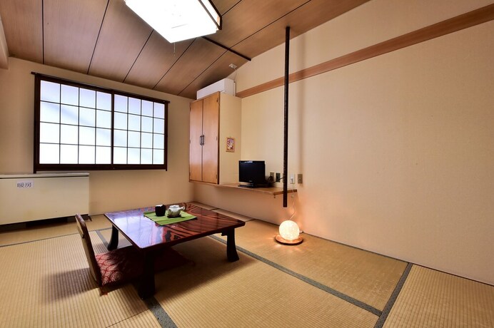 Imagen de la habitación del Hotel Guest House Takenoya. Foto 13