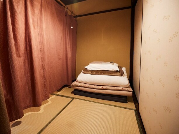 Imagen de la habitación del Hotel Guest House Waraku-an. Foto 18