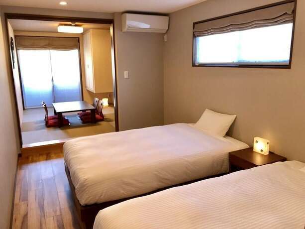Imagen de la habitación del Hotel Guest House Yukari Kyoto. Foto 31