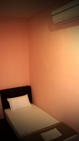 Imagen de la habitación del Hotel Guest Inn Muntri. Foto 4