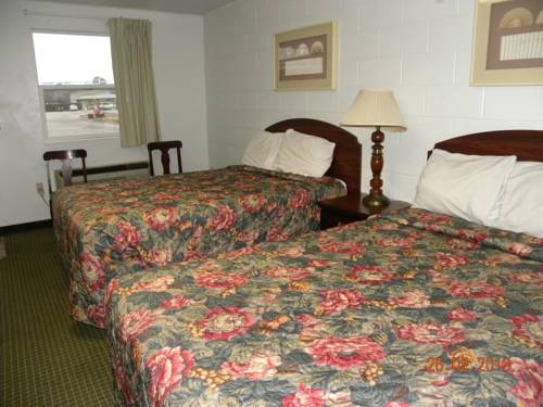 Imagen de la habitación del Hotel Guest Inn, Rogers. Foto 2