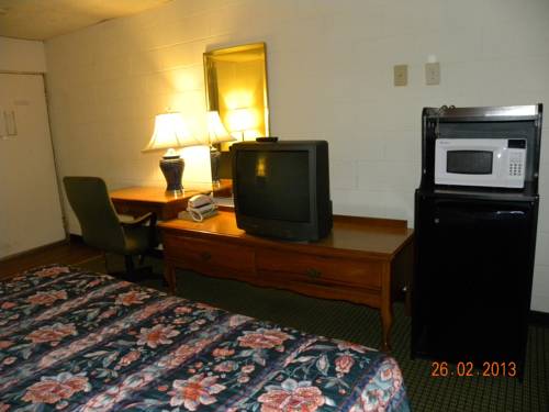 Imagen de la habitación del Hotel Guest Inn, Rogers. Foto 3