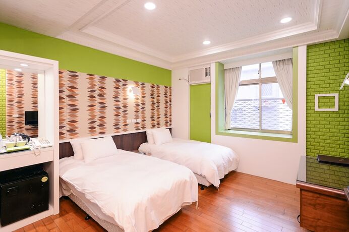 Imagen de la habitación del Hotel Guest Motel-zhubei. Foto 13