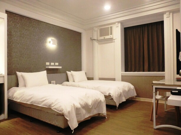 Imagen de la habitación del Hotel Guest Motel-zhubei. Foto 16