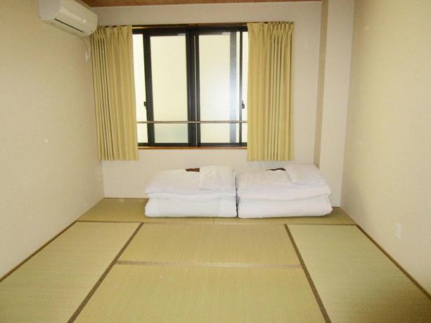 Imagen de la habitación del Hotel GuestHouse Kyotoabiya. Foto 7