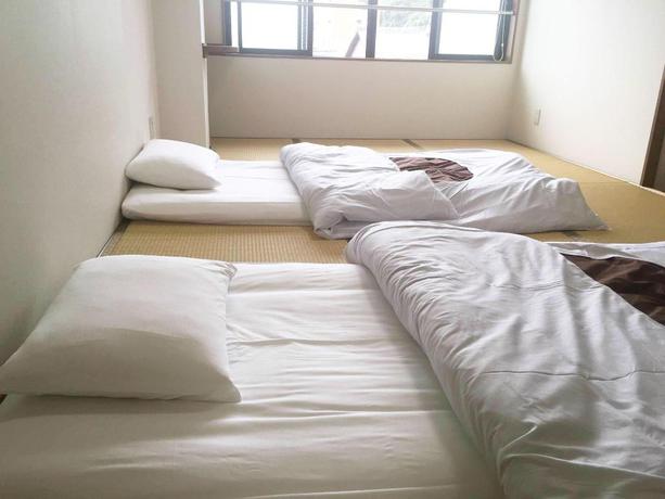 Imagen de la habitación del Hotel GuestHouse Kyotoabiya. Foto 10