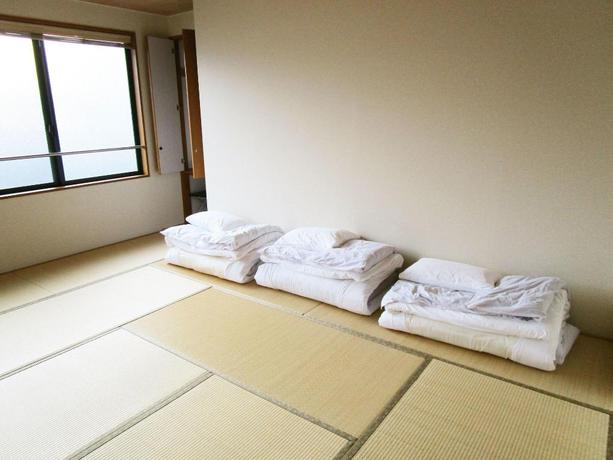 Imagen de la habitación del Hotel GuestHouse Kyotoabiya. Foto 11