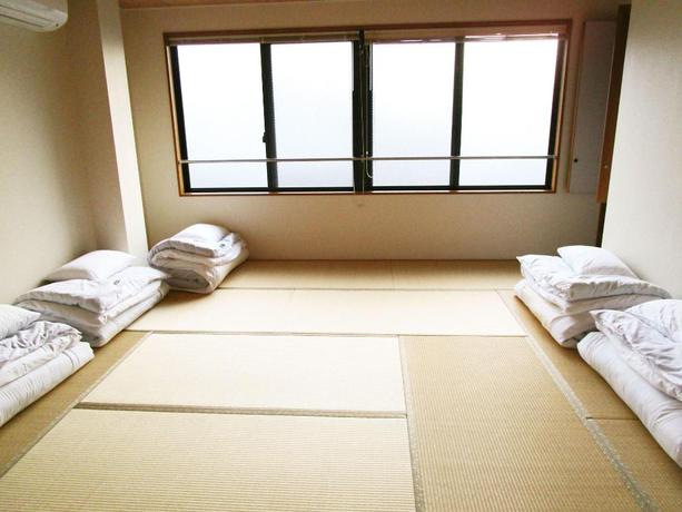 Imagen de la habitación del Hotel GuestHouse Kyotoabiya. Foto 12