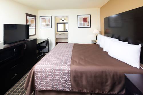Imagen de la habitación del Hotel GuestPlace Inn and Suites. Foto 3