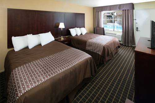 Imagen de la habitación del Hotel GuestPlace Inn and Suites. Foto 4