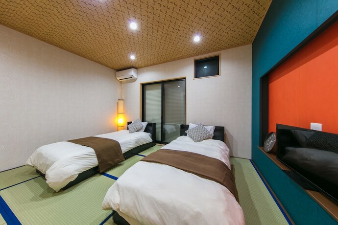 Imagen de la habitación del Hotel Guesthouse Higasikujyou Yanagi Sitamachi. Foto 19