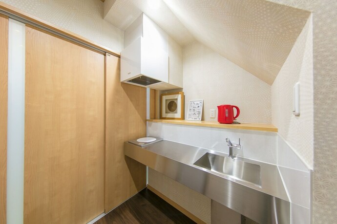 Imagen de la habitación del Hotel Guesthouse Higasikujyou Yanagi Sitamachi. Foto 21