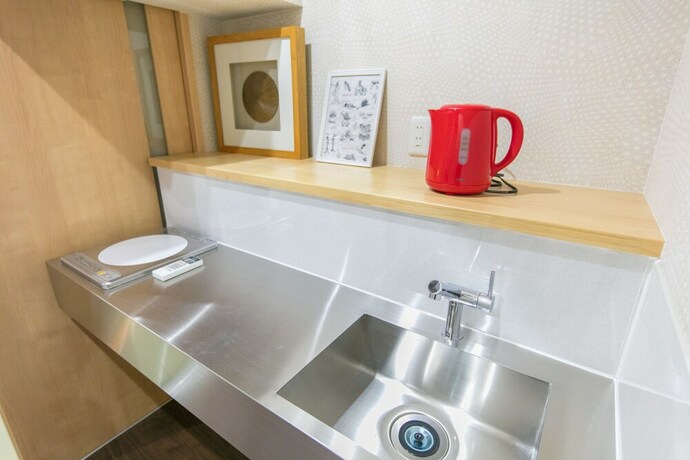 Imagen de la habitación del Hotel Guesthouse Higasikujyou Yanagi Sitamachi. Foto 22