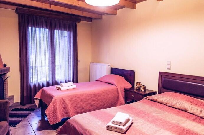 Imagen de la habitación del Hotel Guesthouse Teloni. Foto 17