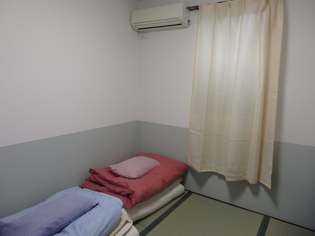 Imagen de la habitación del Hotel Guesthouse Yahata. Foto 5