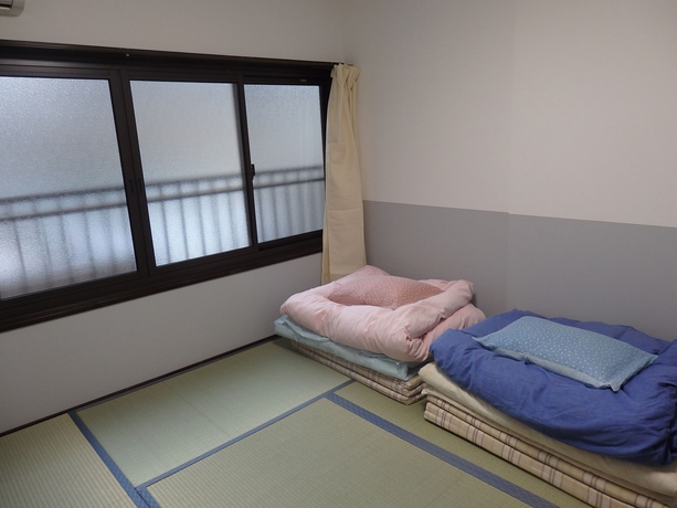 Imagen de la habitación del Hotel Guesthouse Yahata. Foto 11