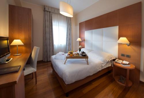 Imagen de la habitación del Hotel Guglielmo. Foto 6