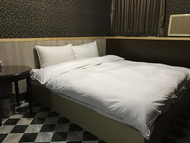 Imagen de la habitación del Hotel Gui Zu. Foto 22