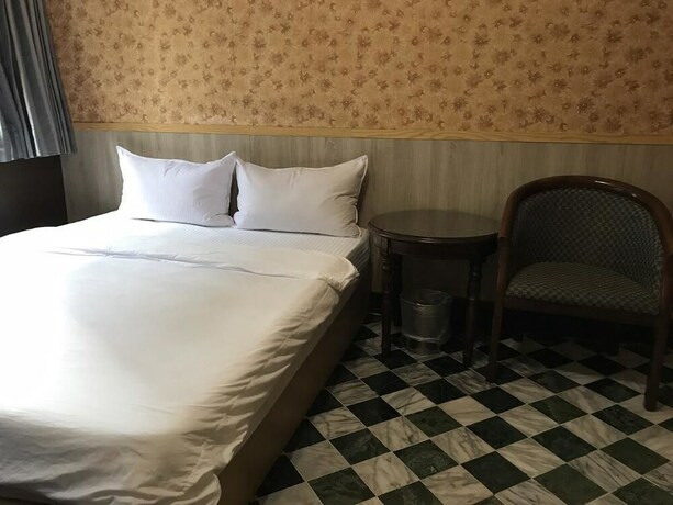 Imagen de la habitación del Hotel Gui Zu. Foto 25