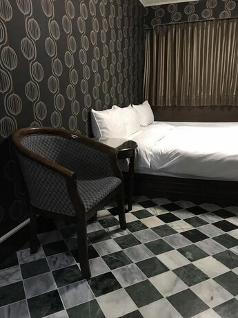 Imagen de la habitación del Hotel Gui Zu. Foto 26