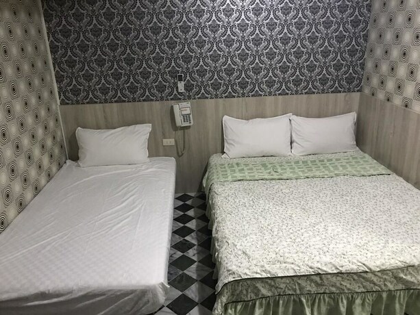 Imagen de la habitación del Hotel Gui Zu. Foto 27