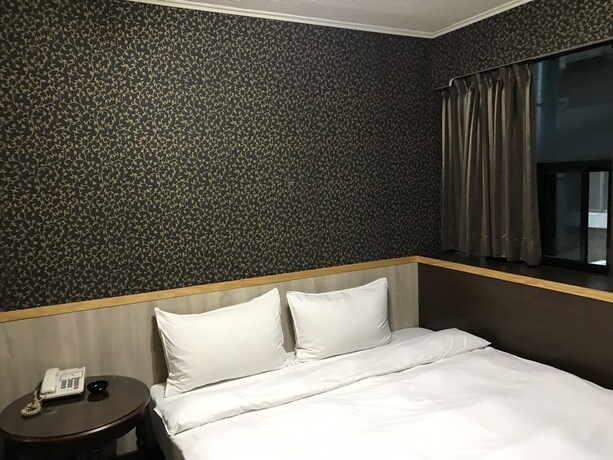 Imagen de la habitación del Hotel Gui Zu. Foto 30