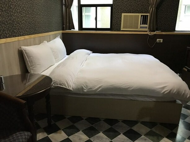 Imagen de la habitación del Hotel Gui Zu. Foto 31