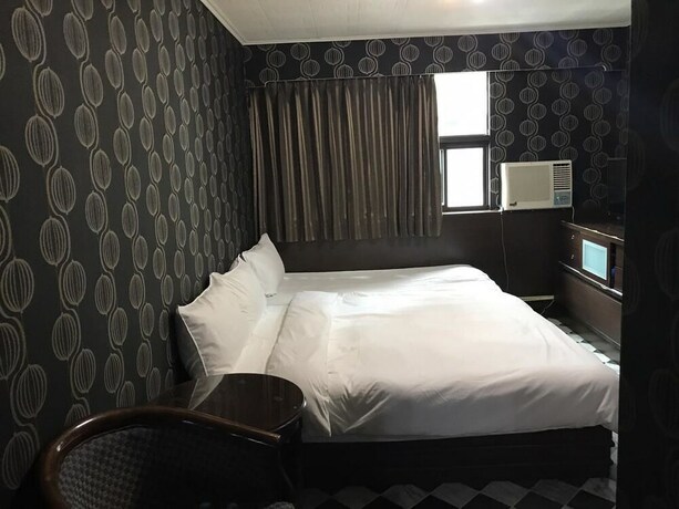 Imagen de la habitación del Hotel Gui Zu. Foto 34