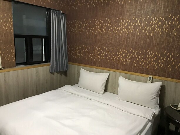 Imagen de la habitación del Hotel Gui Zu. Foto 39