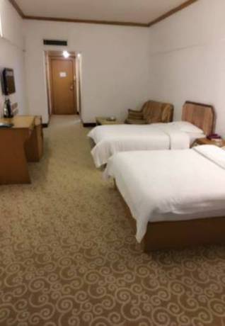 Imagen de la habitación del Hotel Guibin Lou. Foto 3