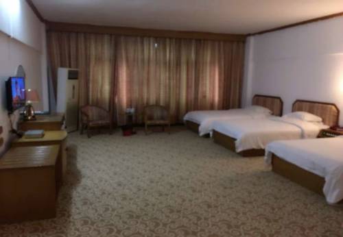 Imagen de la habitación del Hotel Guibin Lou. Foto 5