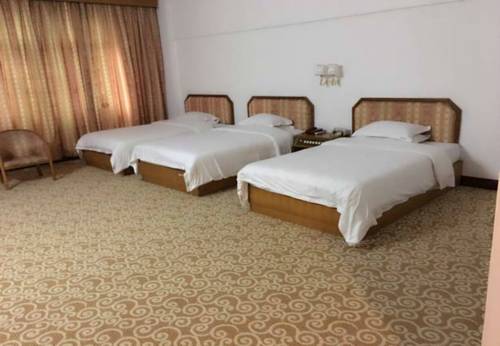 Imagen de la habitación del Hotel Guibin Lou. Foto 6