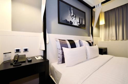 Imagen de la habitación del Hotel Guide Kaoshiung Liuhe. Foto 6