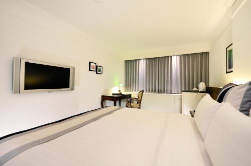 Imagen de la habitación del Hotel Guide Kaoshiung Liuhe. Foto 10