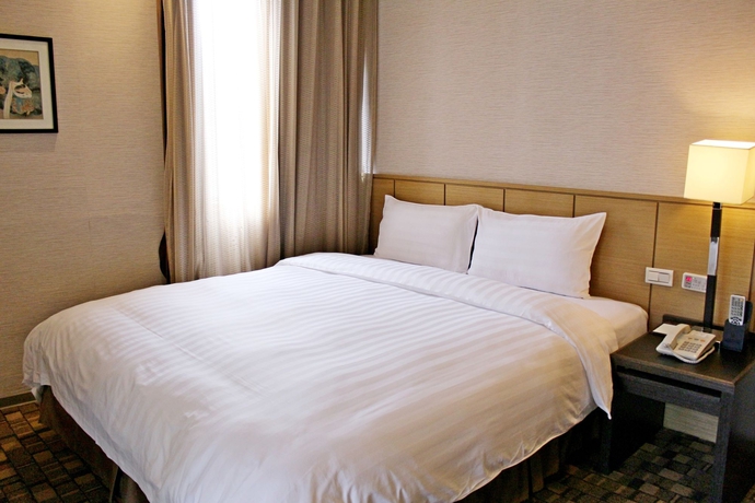 Imagen de la habitación del Hotel Guide Taipei Chongqing. Foto 8