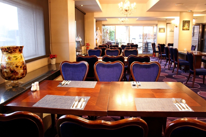 Imagen del bar/restaurante del Hotel Guide Taipei Chongqing. Foto 3