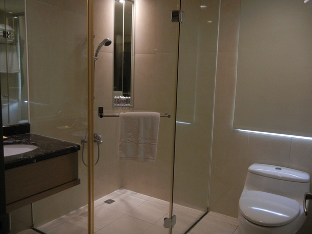 Imagen de la habitación del Hotel Guide Taipei Chongqing. Foto 11