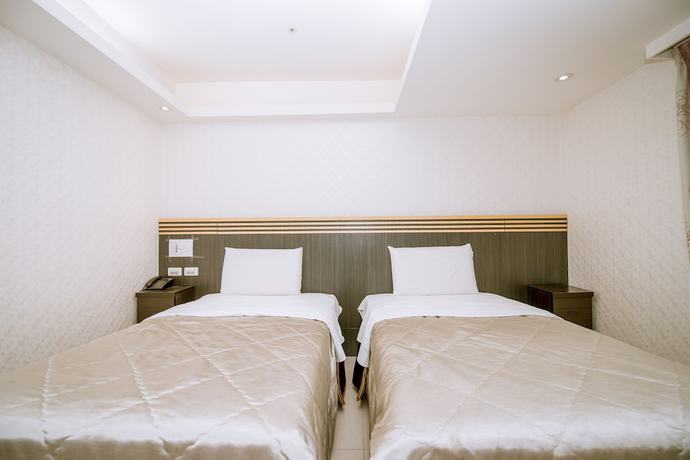 Imagen de la habitación del Hotel Guide Taoyuan Fuxing. Foto 8