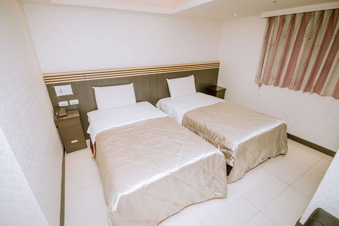 Imagen de la habitación del Hotel Guide Taoyuan Fuxing. Foto 9